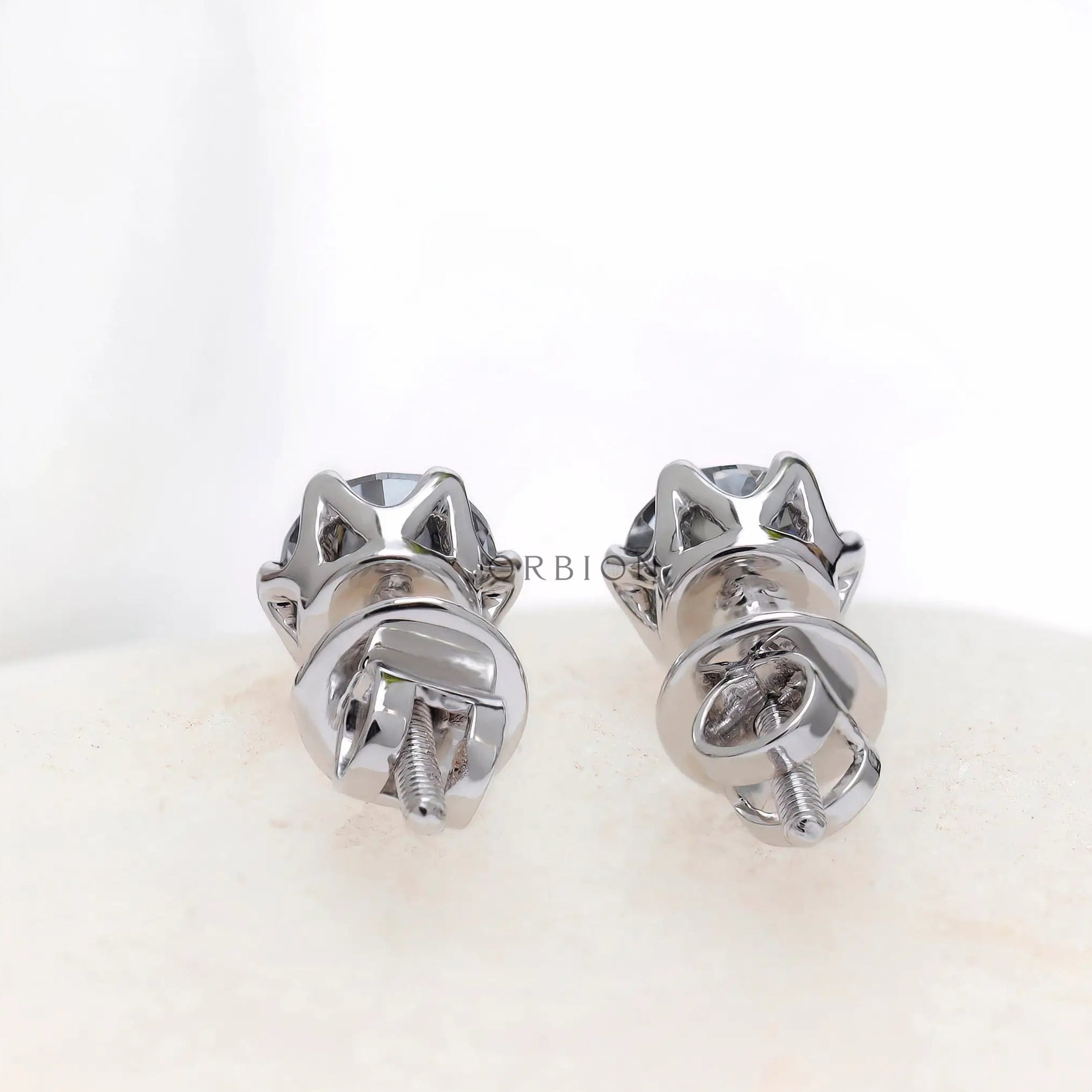 Back view white gold screw back moissanite stud earrings