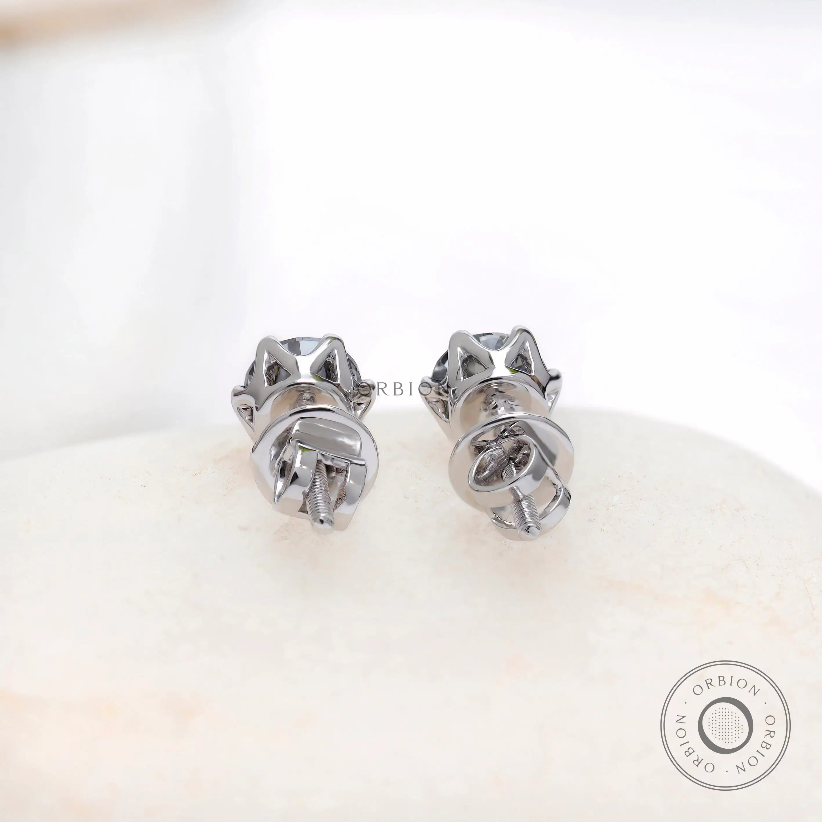 Back view white gold screw back moissanite stud earrings