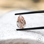 Close view of pink pear brilliant cut lab diamond