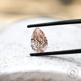 Close view of pink pear brilliant cut lab diamond