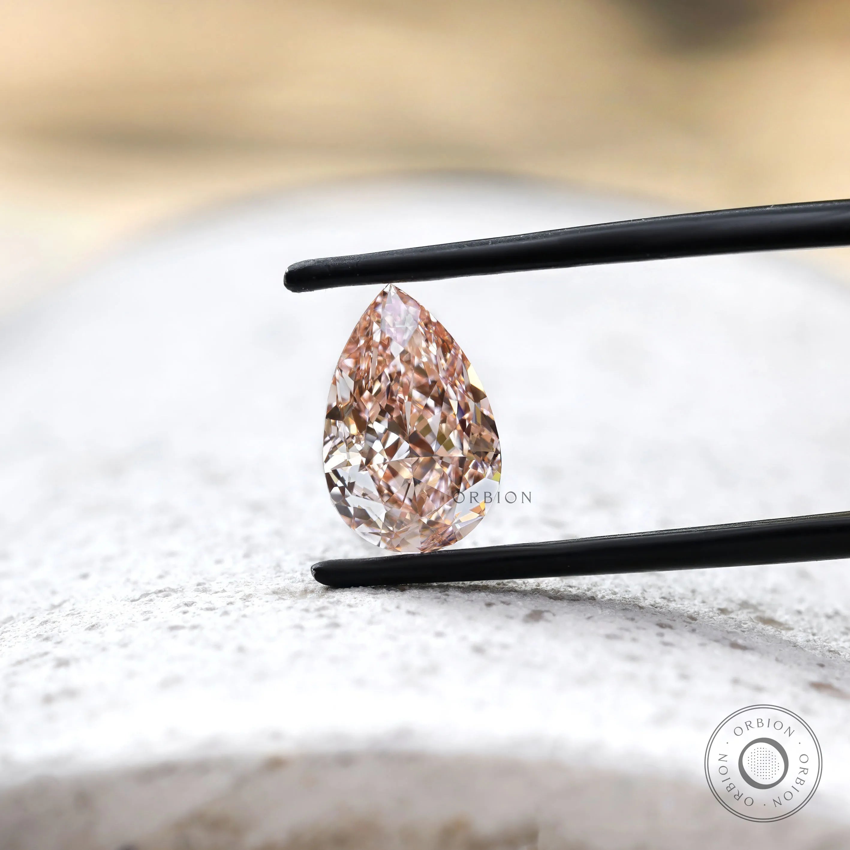 Close view of pink pear brilliant cut lab diamond