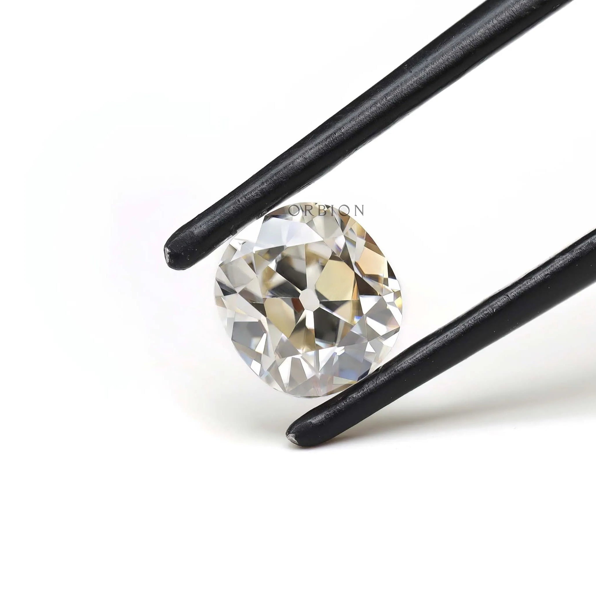 Angled front view of elongated cushion loose moissanite stone