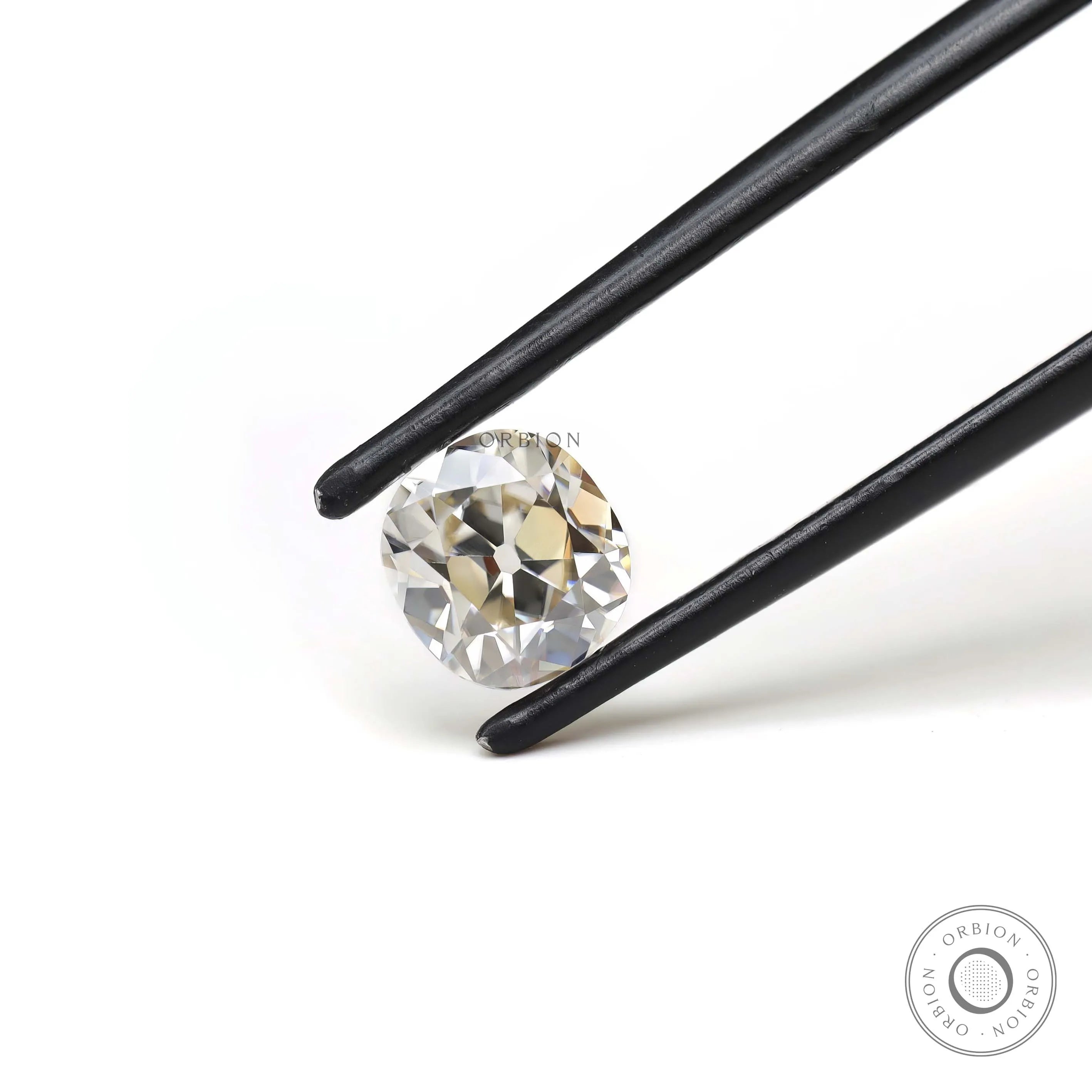 Angled front view of elongated cushion loose moissanite stone