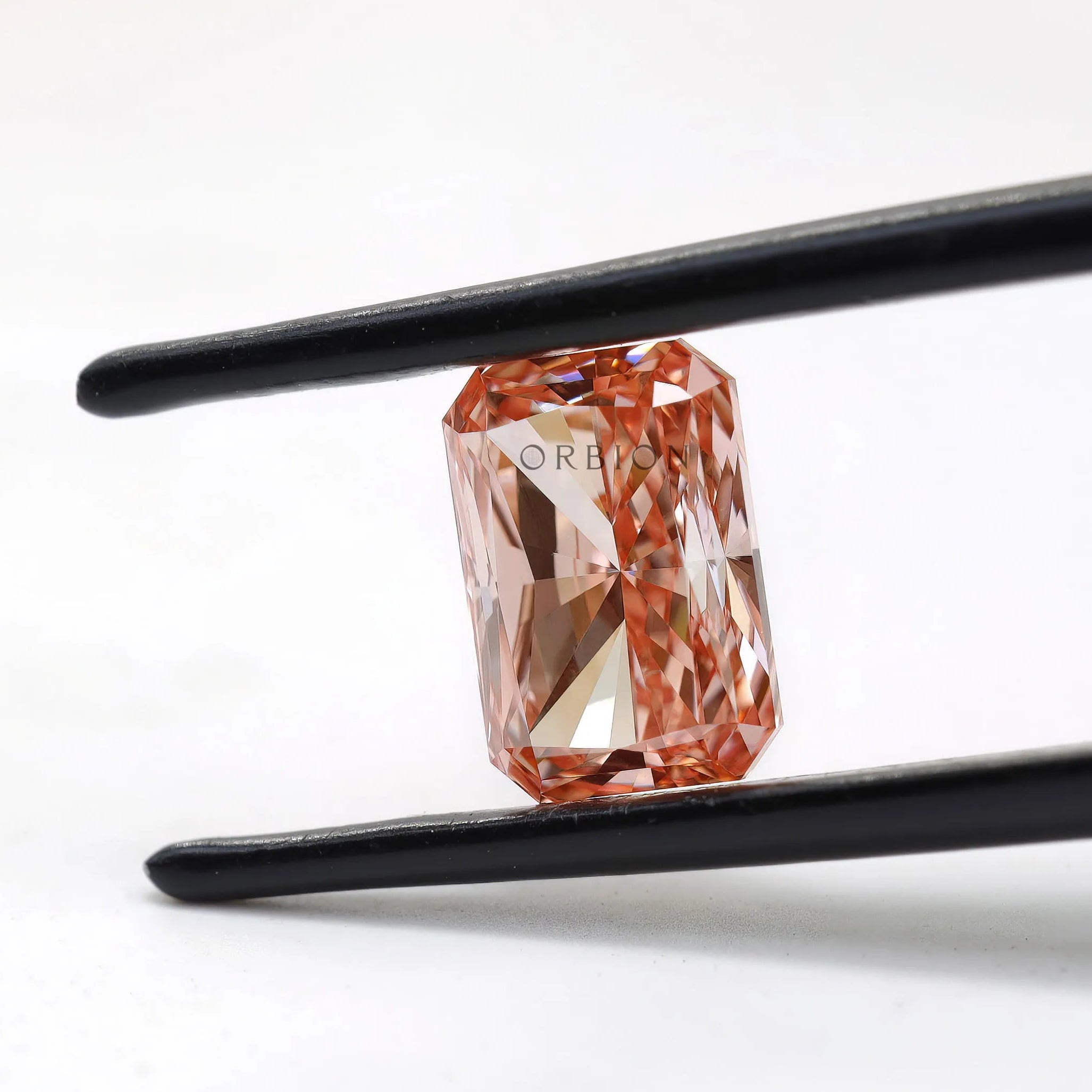 Side profile of fancy pink radiant cut lab diamond