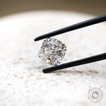 Side angled cushion moissanite with brilliant faceting detail