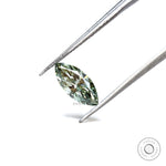 Fancy vivid green marquise diamond on textured surface