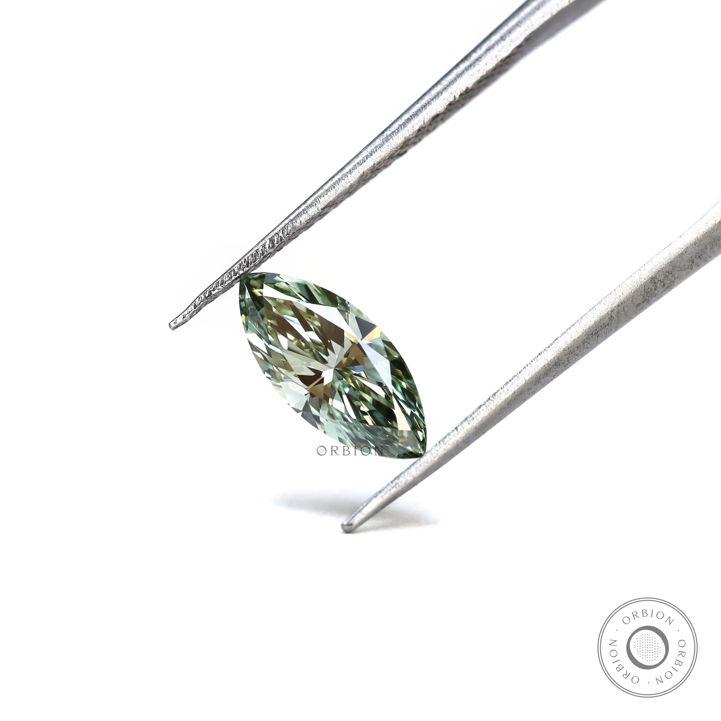 Fancy vivid green marquise diamond on textured surface