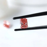 Side view of matching pink radiant lab diamond pair