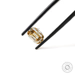 Side profile of champagne elongated cushion loose moissanite