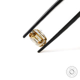 Side profile of champagne elongated cushion loose moissanite