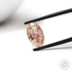 Angled oval pink diamond highlighting modified brilliant cut sparkle