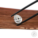Pear brilliant cut loose diamond shown on neutral stone surface