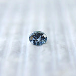 Face-up view of round brilliant intense blue lab diamond