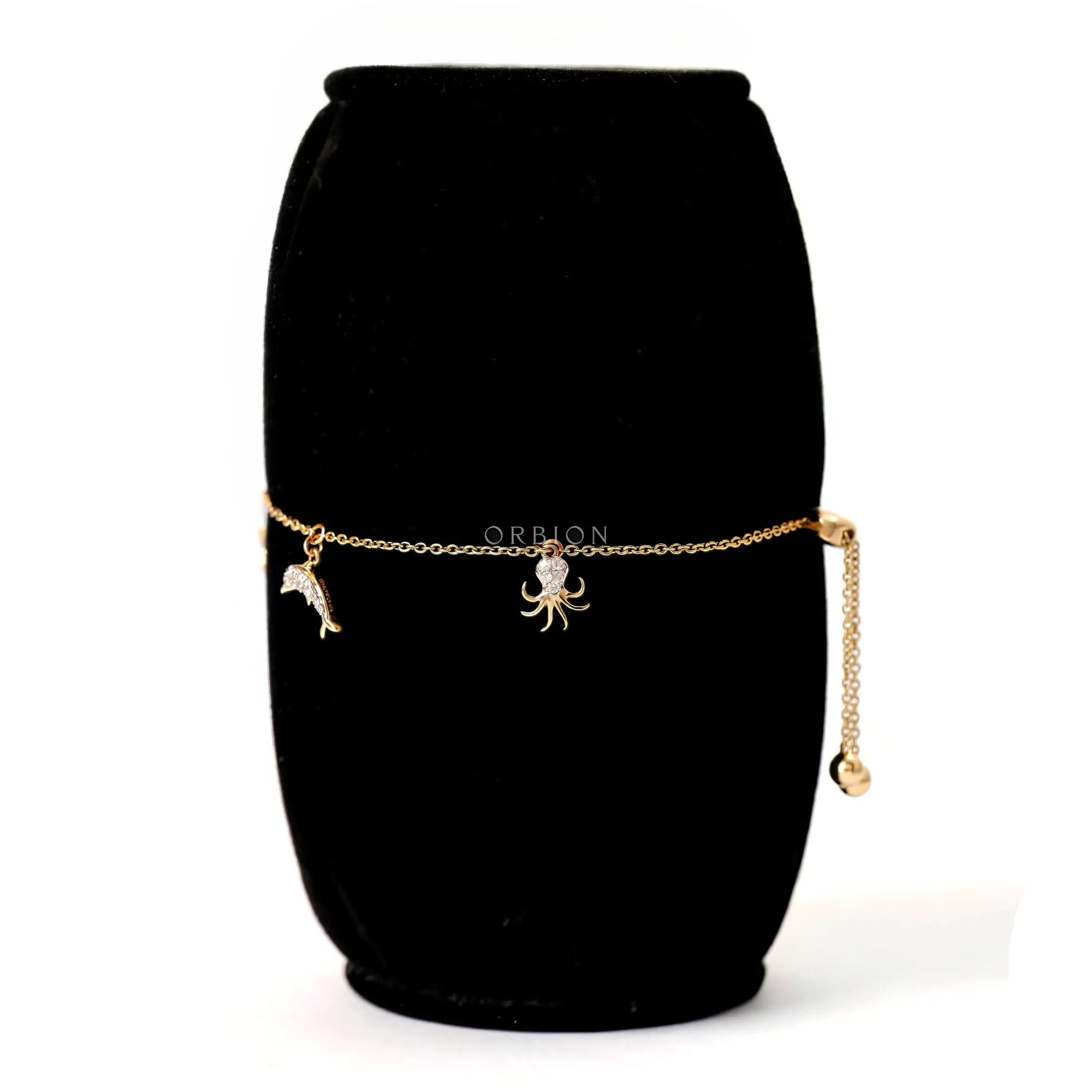 Opposite charm view starfish dolphin octopus bracelet yellow gold