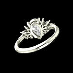 Underside angled view of pear moissanite ring gallery