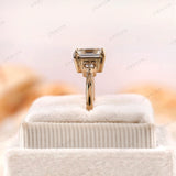 Floral details on asscher moissanite ring in yellow gold