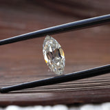 Beautifully cut 1.26 ct marquise moissanite with rainbow reflections