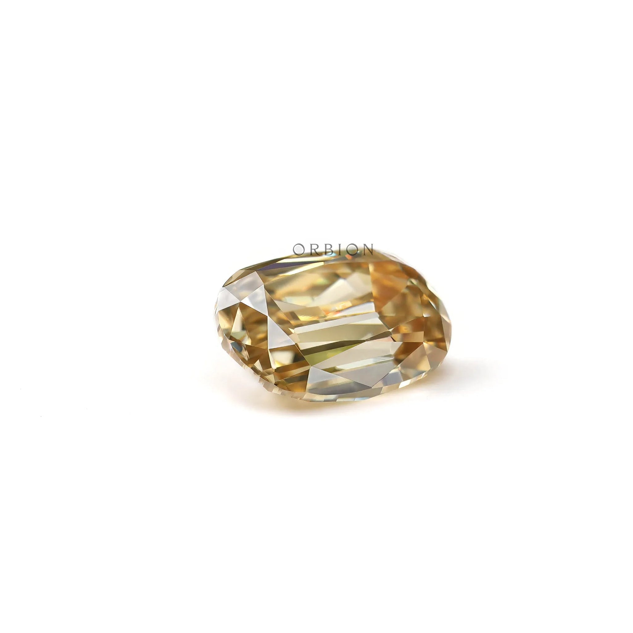 Champagne moissanite elongated cushion shape on white background