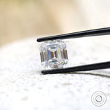 Front view of emerald step cut loose moissanite stone