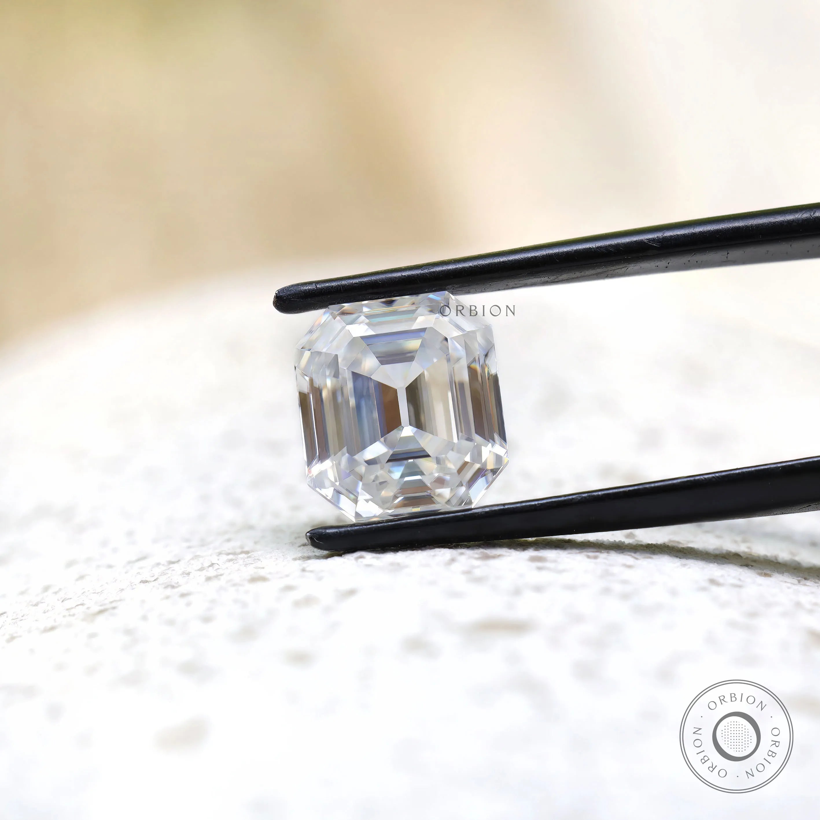 Front view of emerald step cut loose moissanite stone
