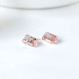 Two radiant pink lab diamonds shown pavilion side