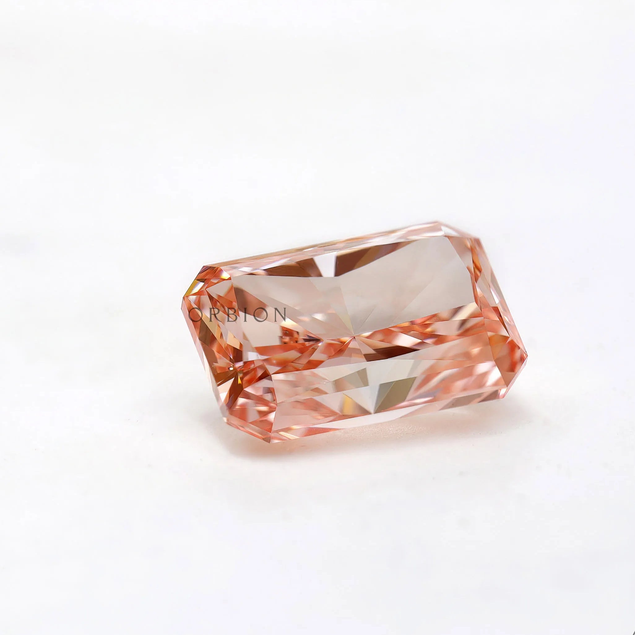 Soft angled view of pink radiant brilliant lab diamond