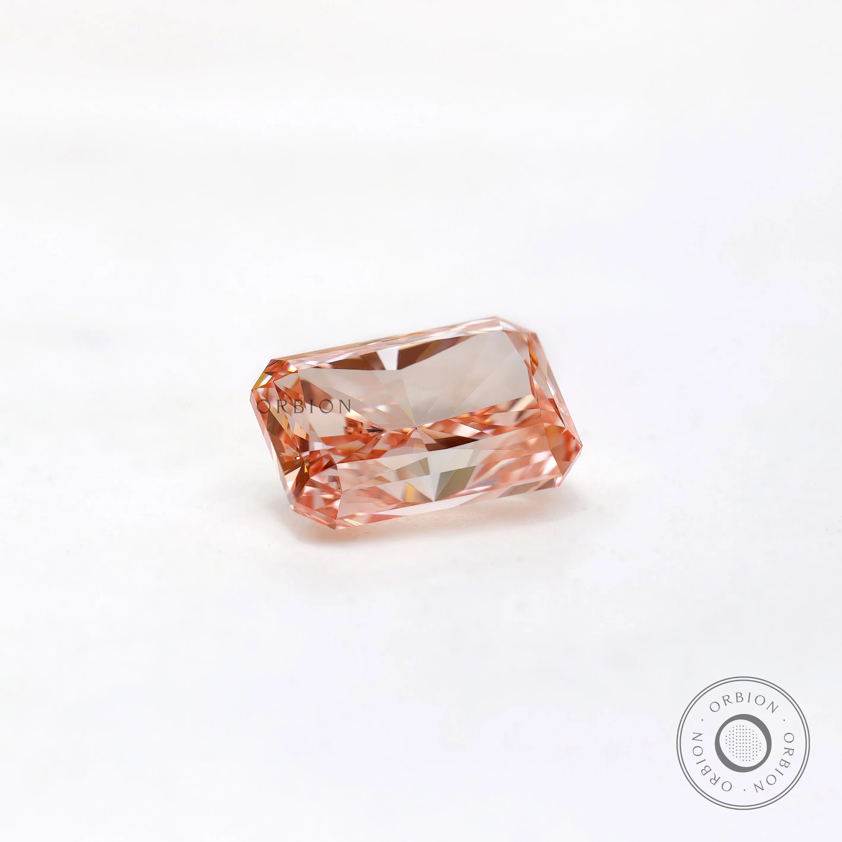 Soft angled view of pink radiant brilliant lab diamond