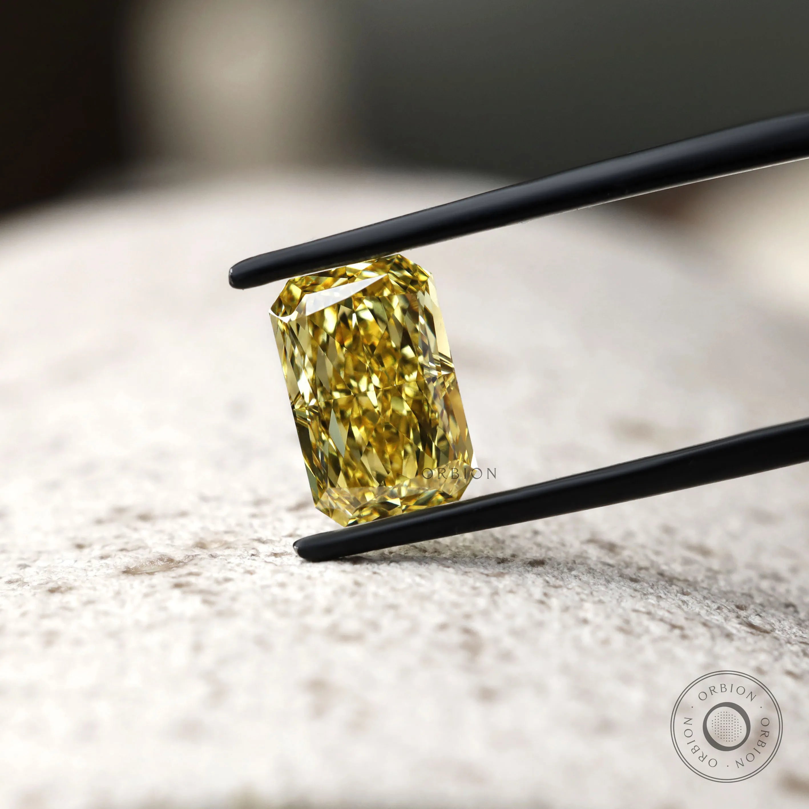 Golden yellow radiant cut loose diamond close view