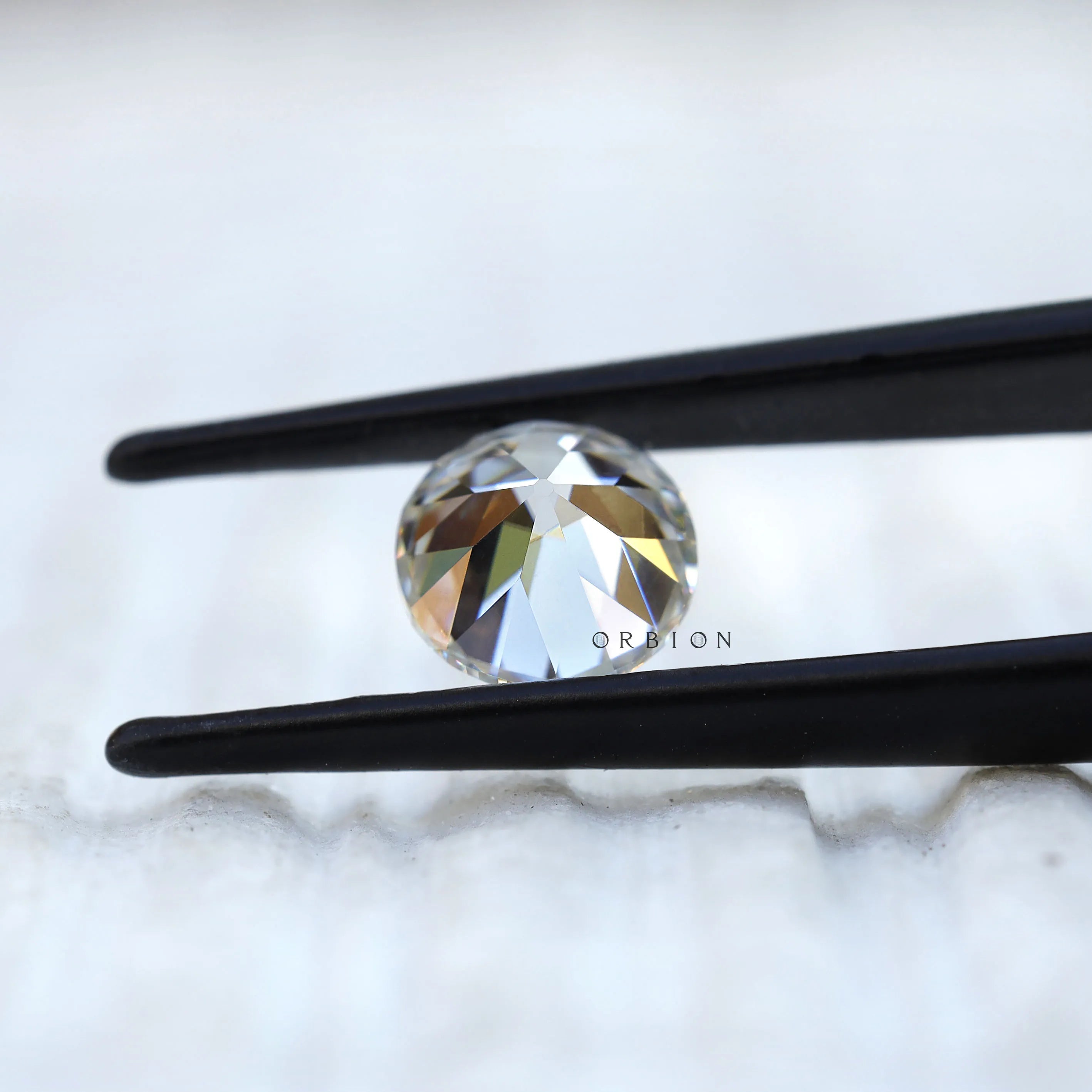 Back profile of round moissanite showing pavilion structure
