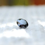 Detailed close-up of 2 CT Round Moissanite stone
