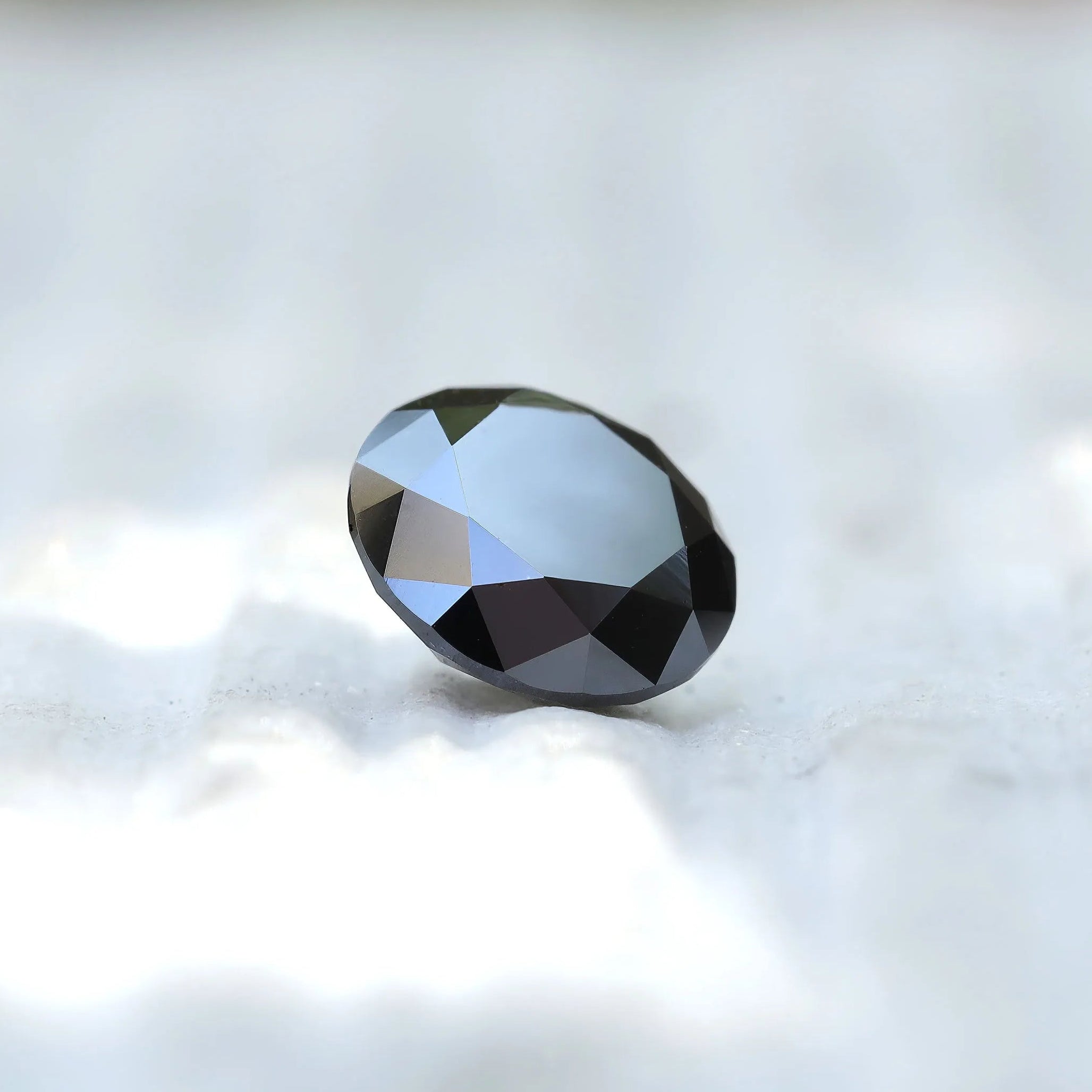 Detailed close-up of 2 CT Round Moissanite stone