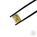 Radiant fancy yellow loose lab diamond face-up isolated view