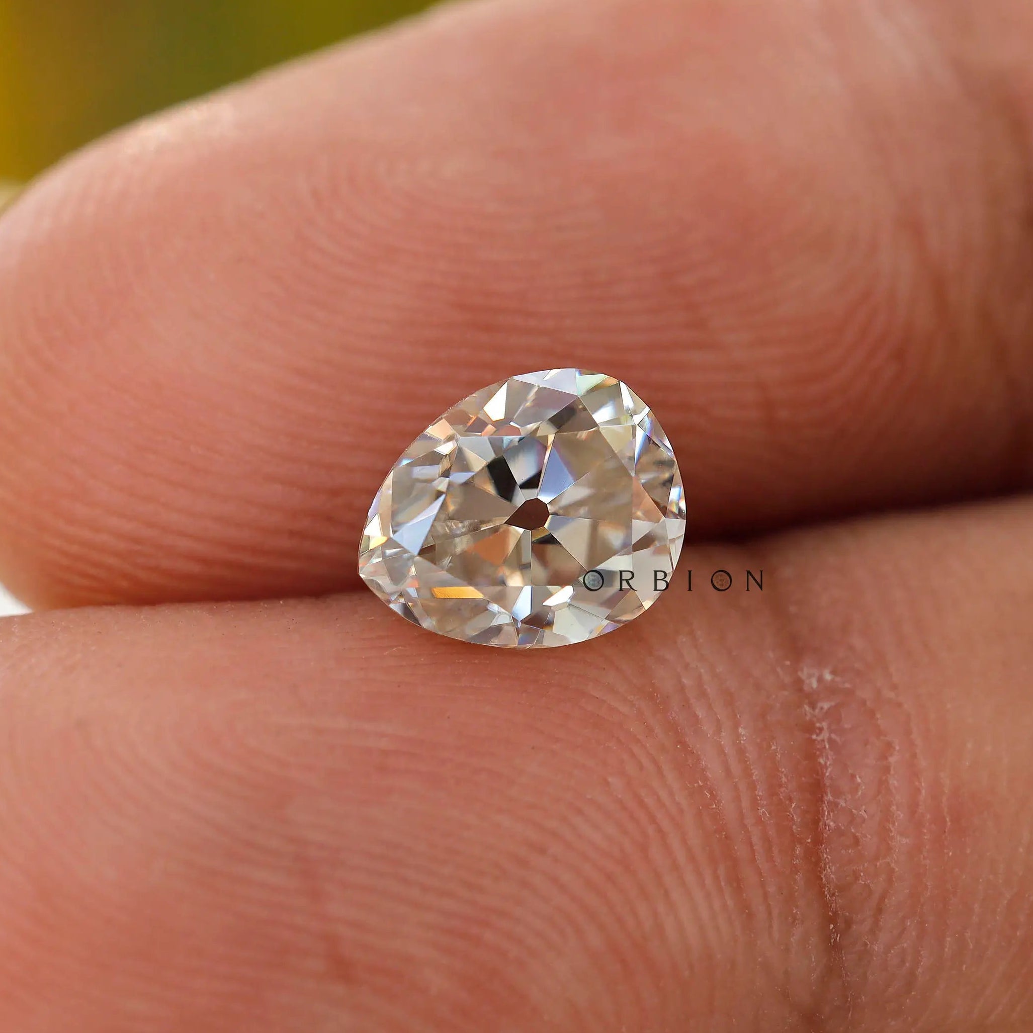 1.35 CT Moissanite Pear Shape Stone in hand