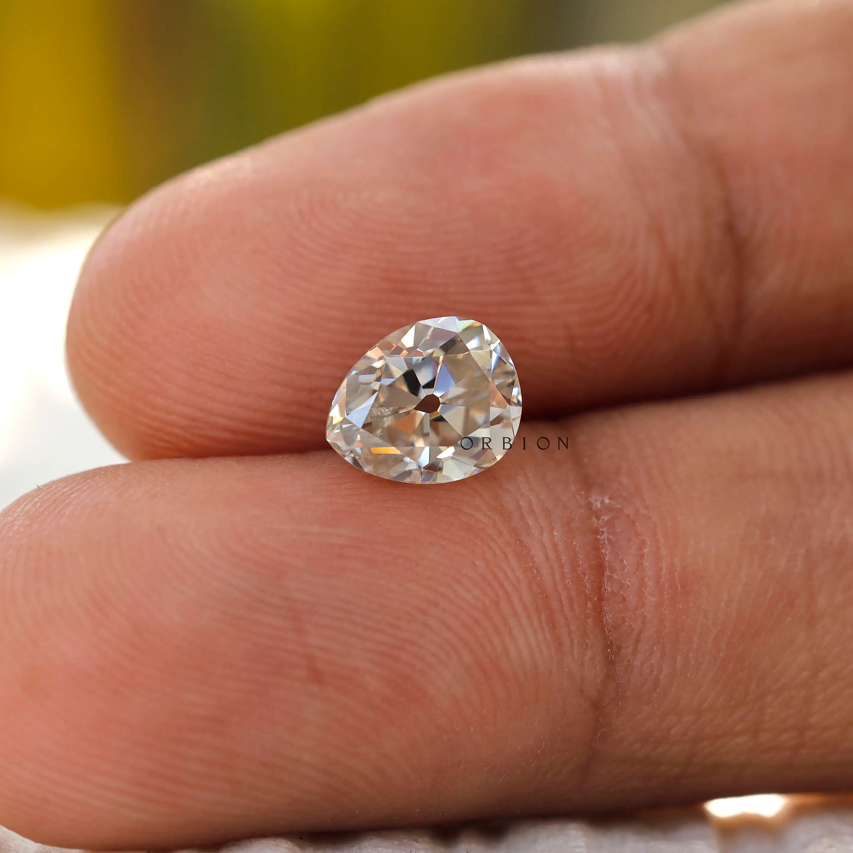 1.35 CT Moissanite Pear Shape Stone in hand