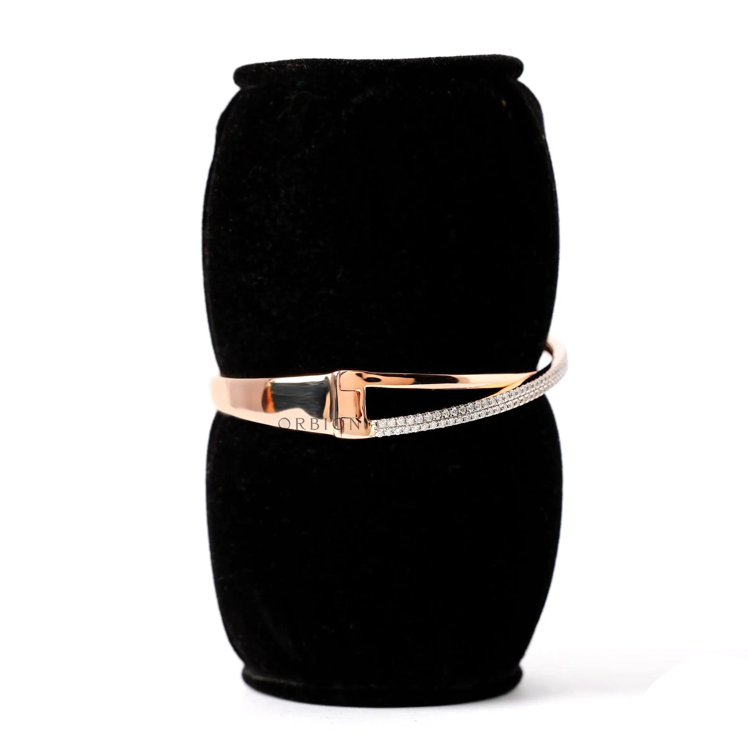 Angled worn view diamond crossover bangle bracelet