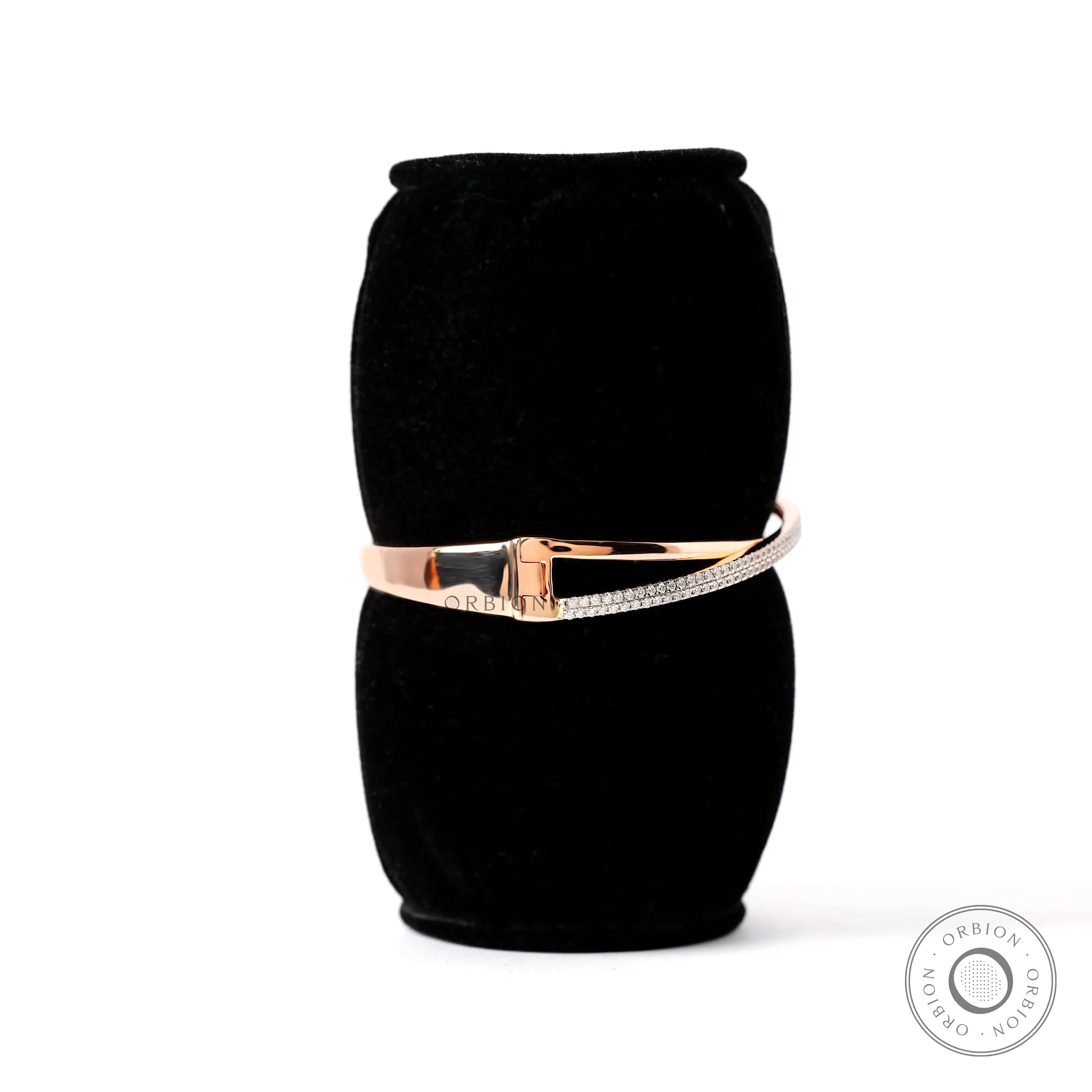 Angled worn view diamond crossover bangle bracelet