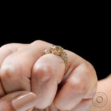 Side wear champagne moissanite three stone ring on finger