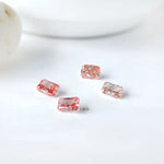 Group shot of four radiant pink lab diamonds