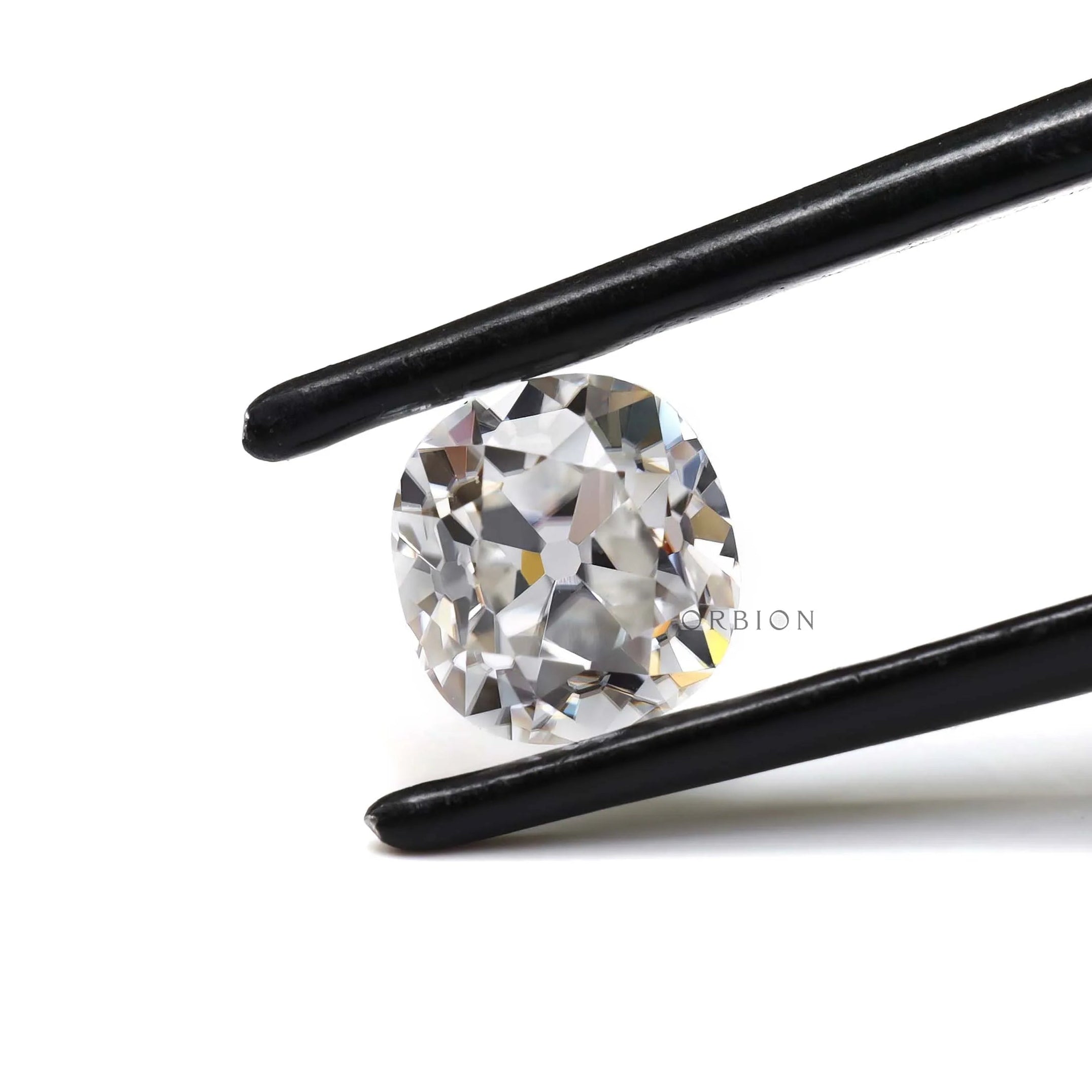 Old mine cut elongated cushion moissanite at side angle