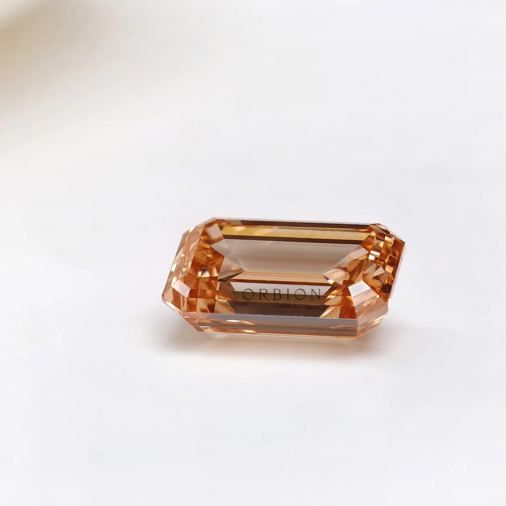 Pavilion angle of fancy orange emerald cut diamond