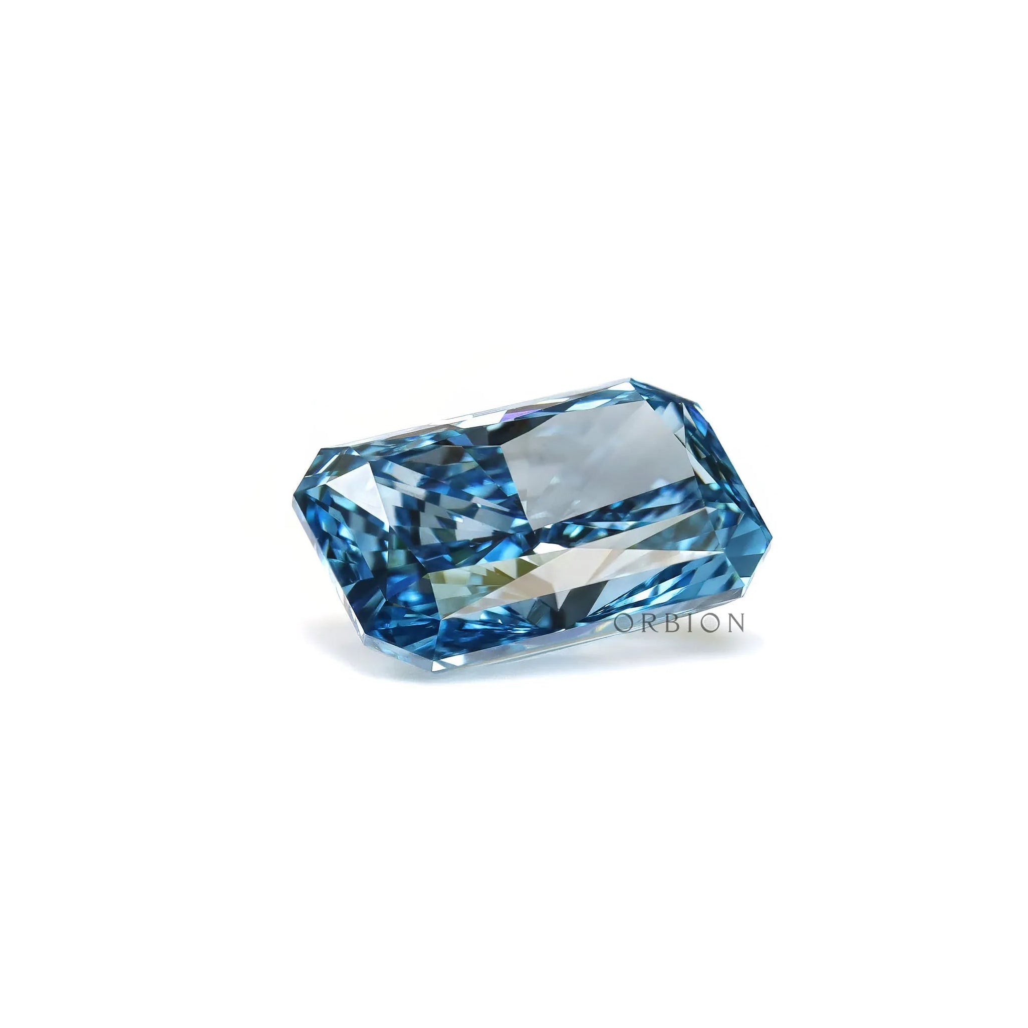 Blue radiant lab diamond resting loose with pavilion view