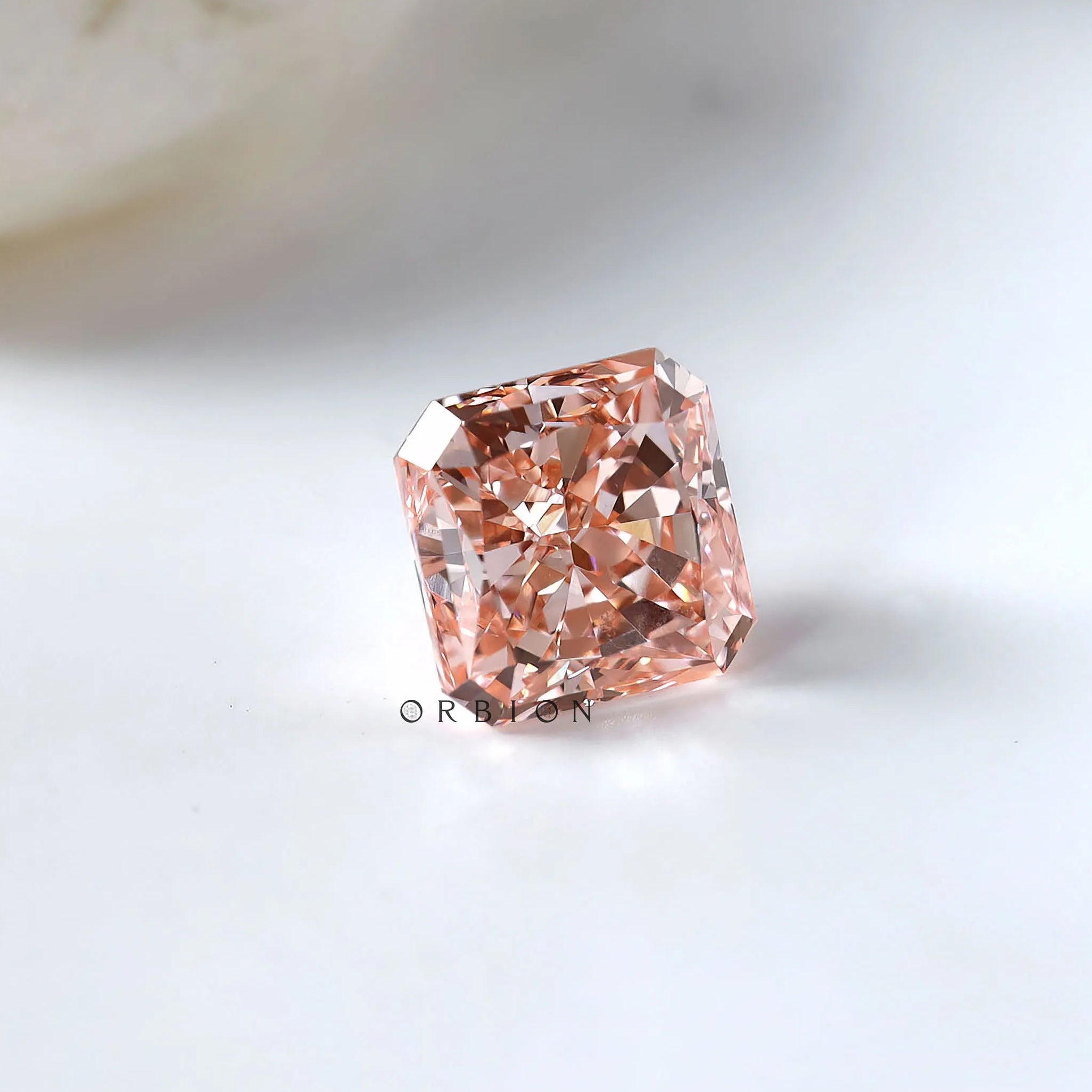Loose radiant vivid pink lab diamond standing upright alone