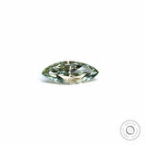 Marquise green lab diamond lying flat on white background