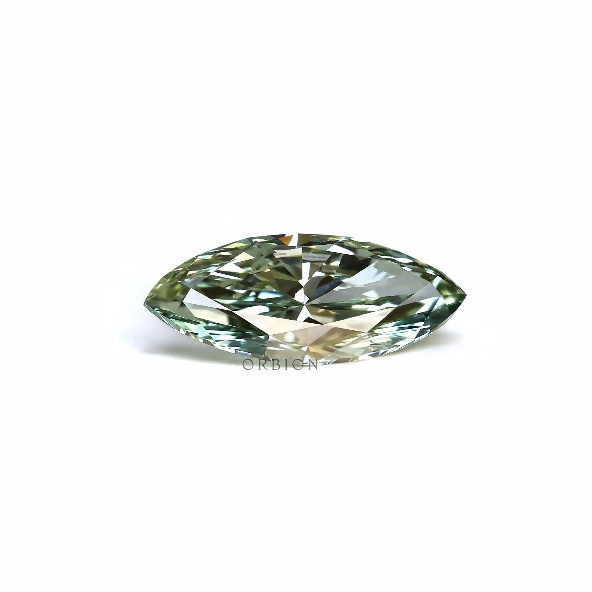 Marquise green lab diamond lying flat on white background
