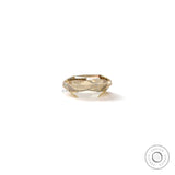 Back view of warm champagne loose moissanite with antique style faceting