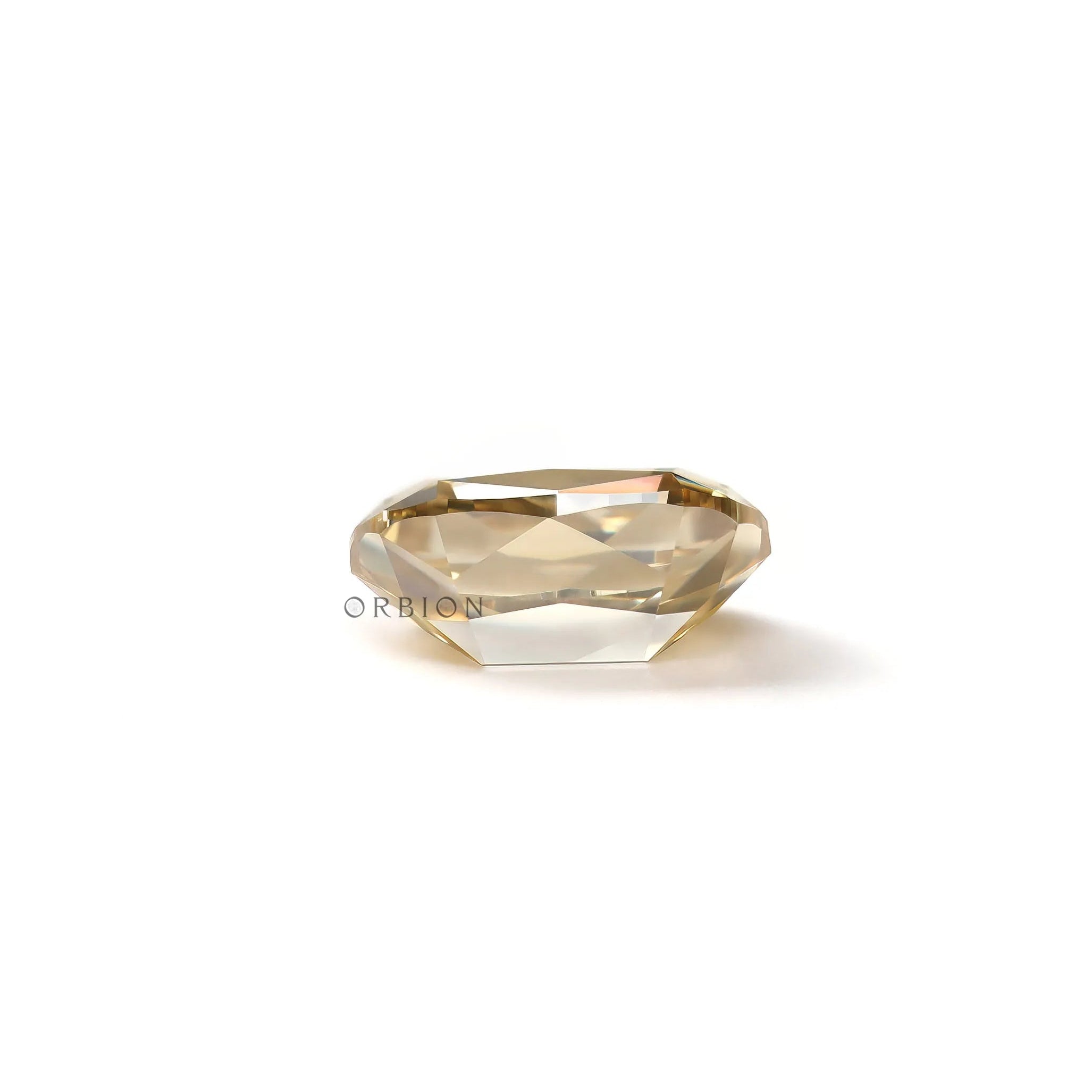 Back view of warm champagne loose moissanite with antique style faceting