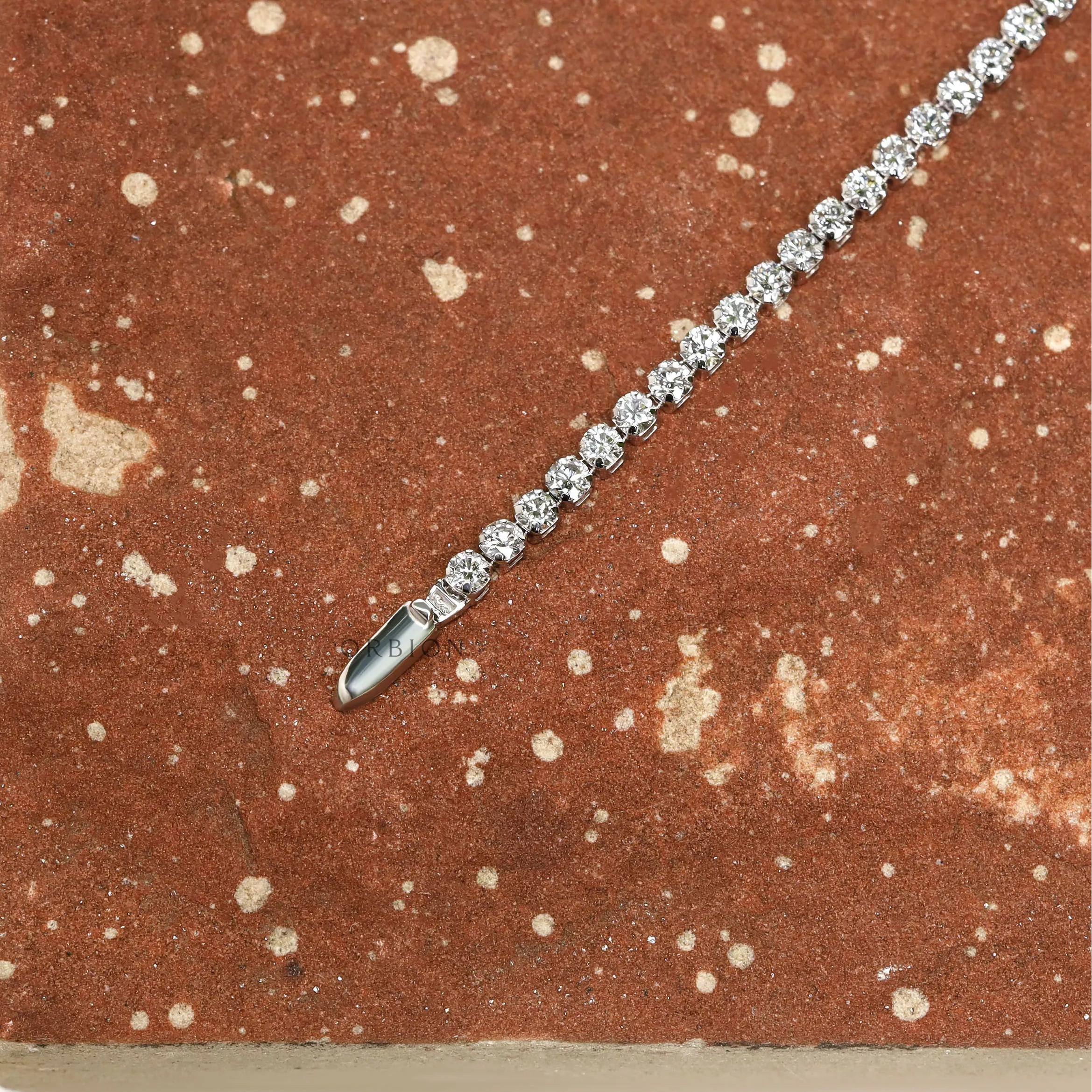 Classic diamond tennis bracelet, delicate design in 14k white gold for young women