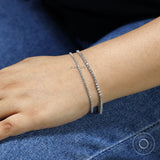 classic dainty diamond tennis bracelet in 14k white gold, perfect for birthdays or graduation gifts