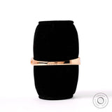 Back view polished crossover bangle bracelet rose gold