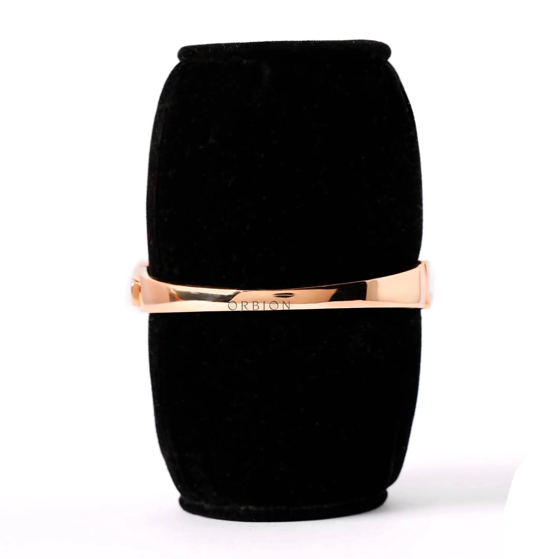 Back view polished crossover bangle bracelet rose gold